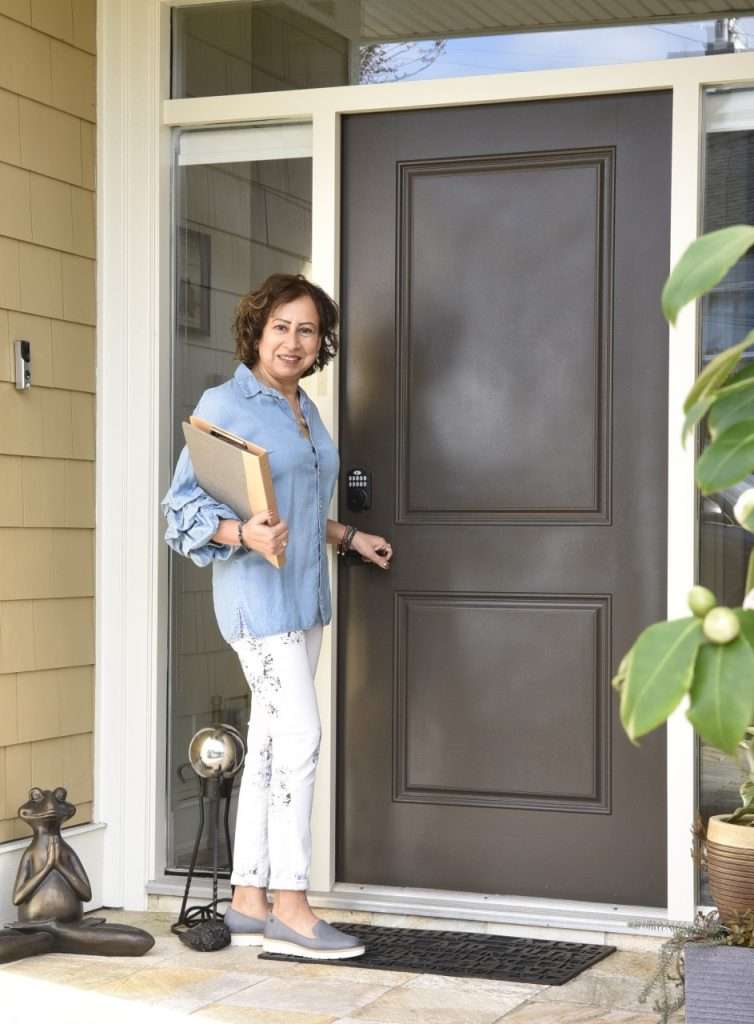 Meena opening the door