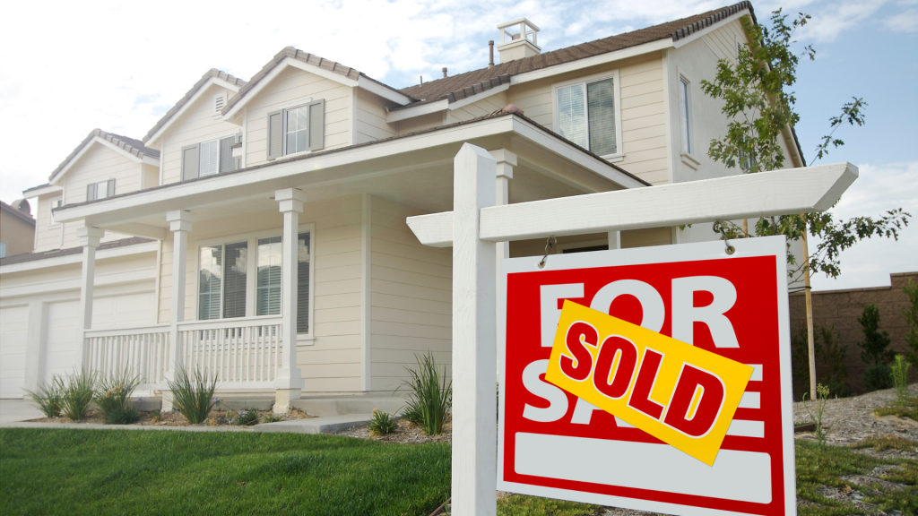 town house with sold sign